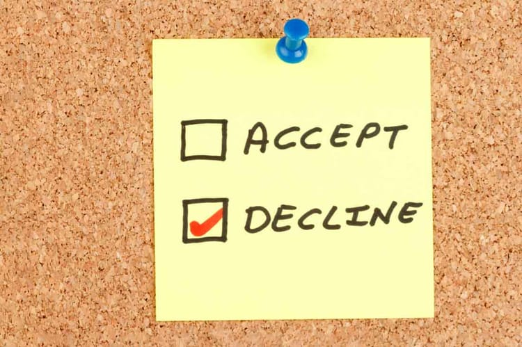 Sticky note posted on a message board with options to accept or decline, with decline checked.