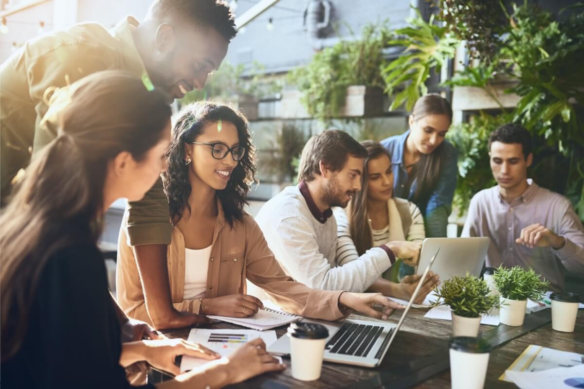 people working together around a picnic table