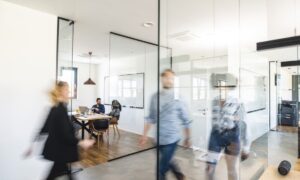 Office with employees in a dynamic workplace.