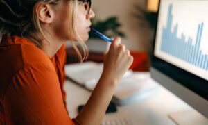 A remote employee using work from home productivity tracking software to understand their productivity.