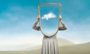 A person holding a frame with a cloud where their head should be.