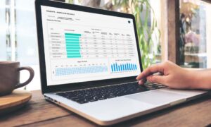 ActivTrak’s workload balance report on a laptop screenshot being shown as a way to overcome challenges in capacity management.
