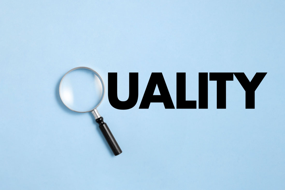 The word Quality spelled out, where the Q is a magnifying glass to symbolize how to measure quality of work