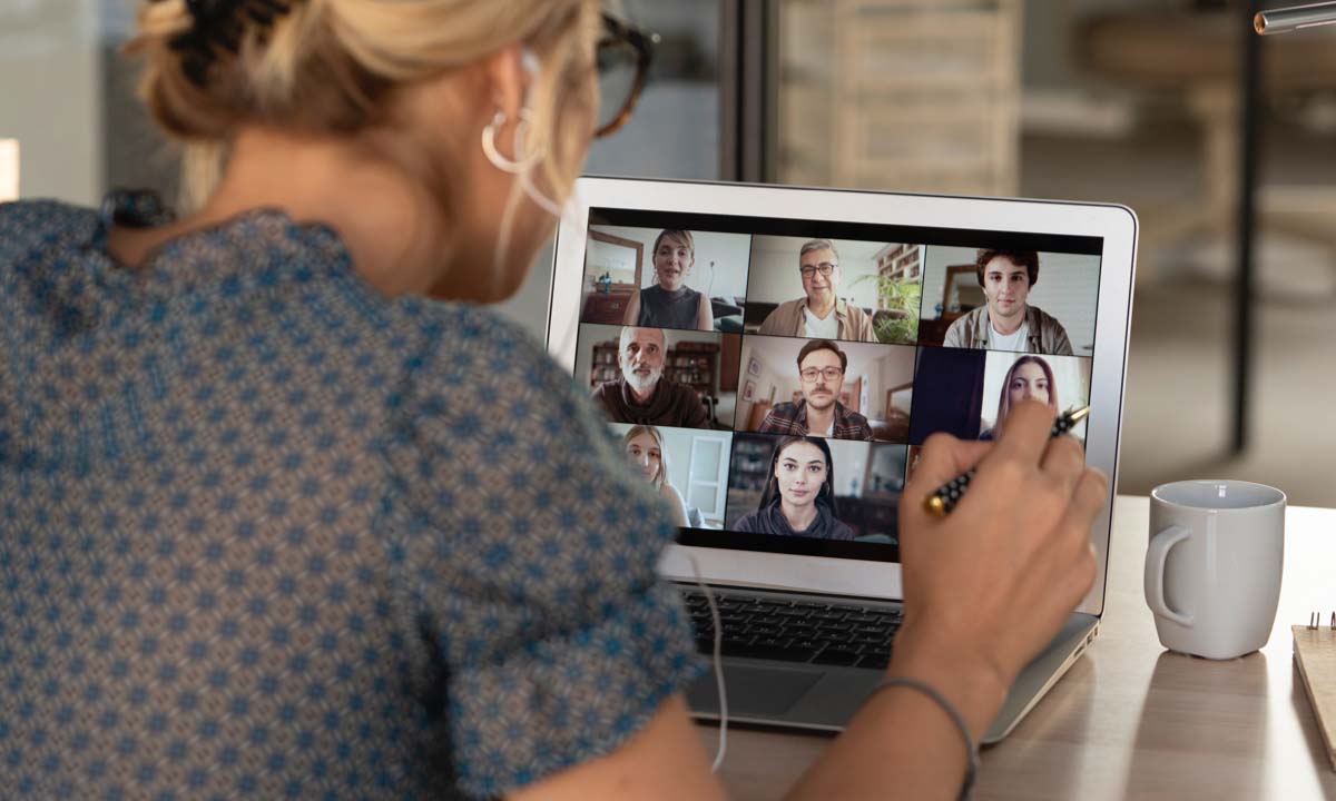 An employee on a zoom meeting, which is the one way many employers feel they can have work from home accountability.