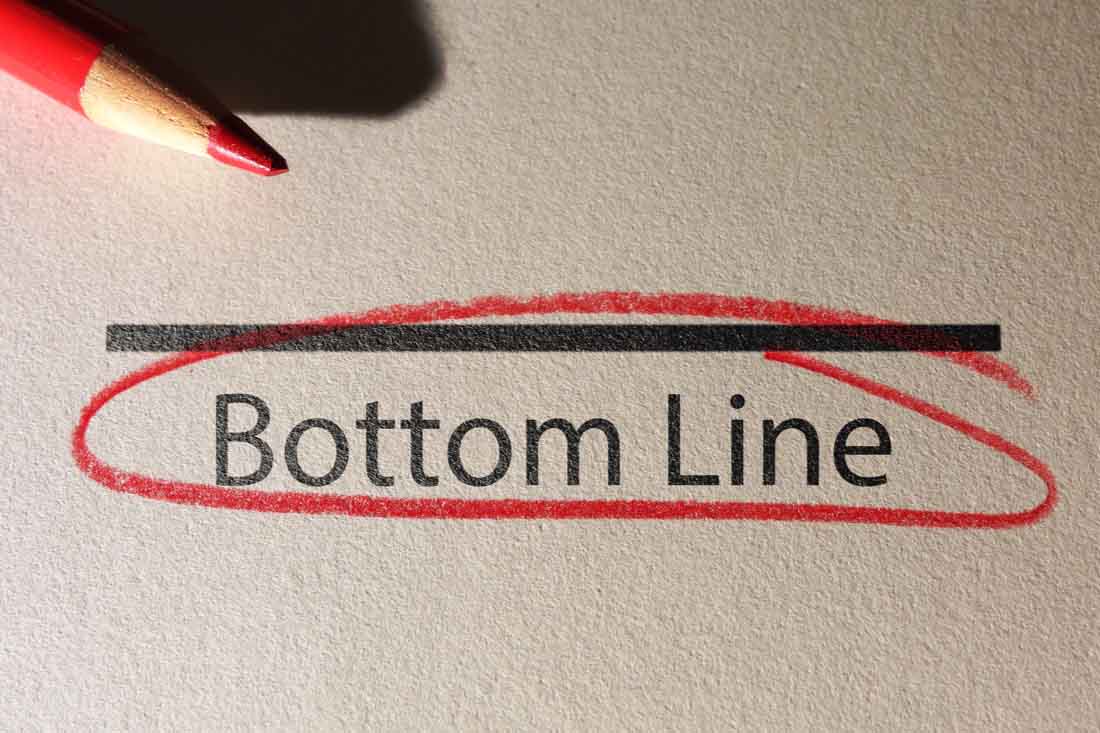 Bottom line written on a piece of paper circled in red.